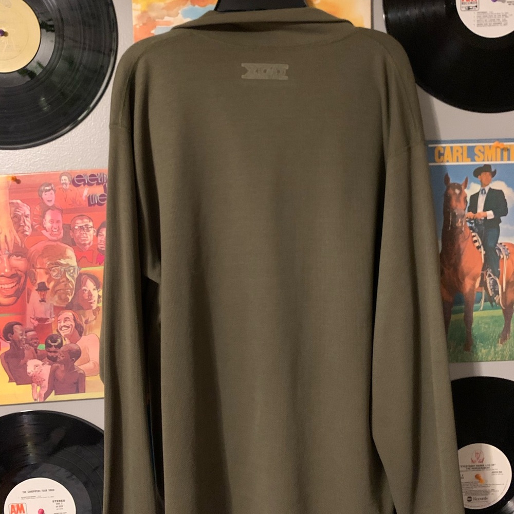 Long green zip half placket shirt